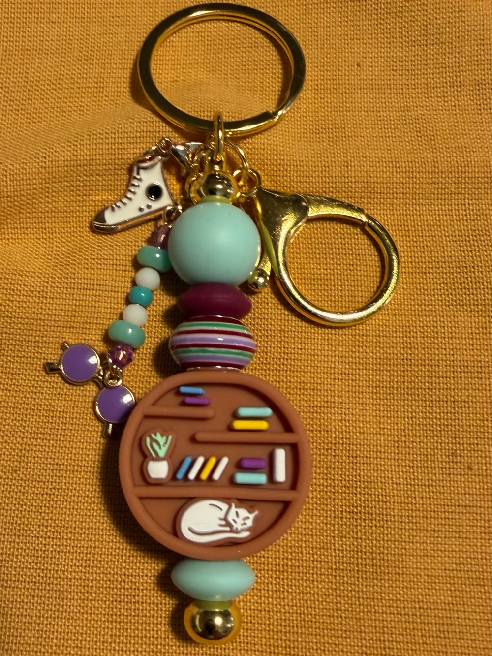 Cute Cat Bookshelf Keychain Charm in Teal and Purple